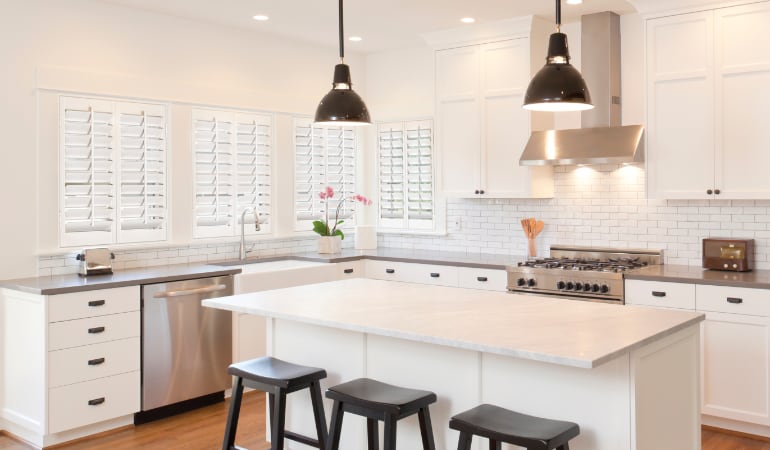 Plantation shutters in a bright Atlanta kitchen.